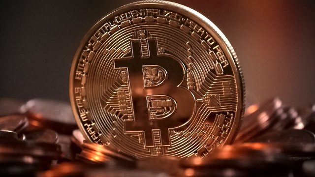 Why is El Salvador defying the IMF to buy more Bitcoin despite economic challenges?